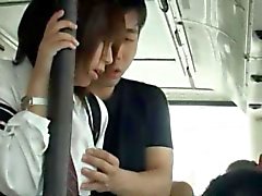 Slutty Asian babe gives head in a public bus