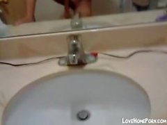 Cute young Asian masturbating in the bathroom