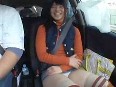 Cutie toys her pussy in a car
