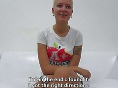 Short haired teen blonde with tattooes strips and poses on casting