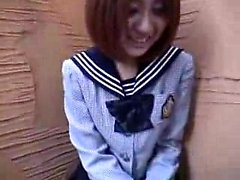 Shy Japanese teen with a pretty smile is ready to be sexual