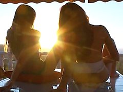 Sunset romance of two teens fingering