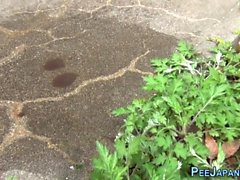 Naughty teens pee outside