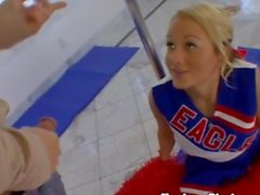 Blonde cheerleader gagging on a cock